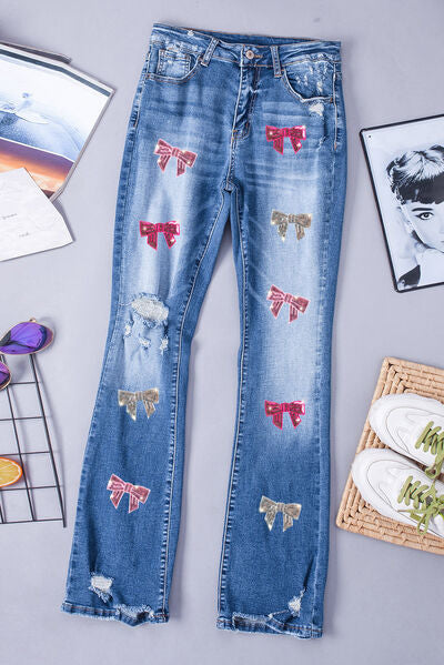 Sequin Bow Distressed Bootcut Jeans